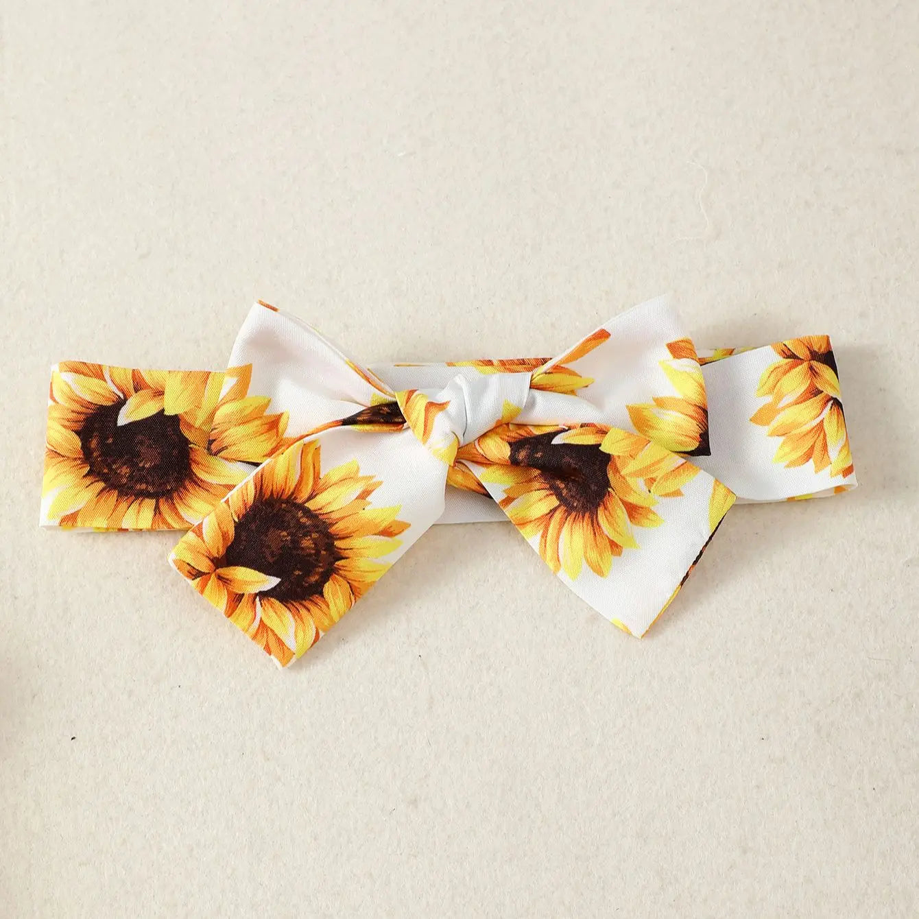 Tenue d’été bébé fille – Ensemble jaune motif tournesols avec jupe et bandeau