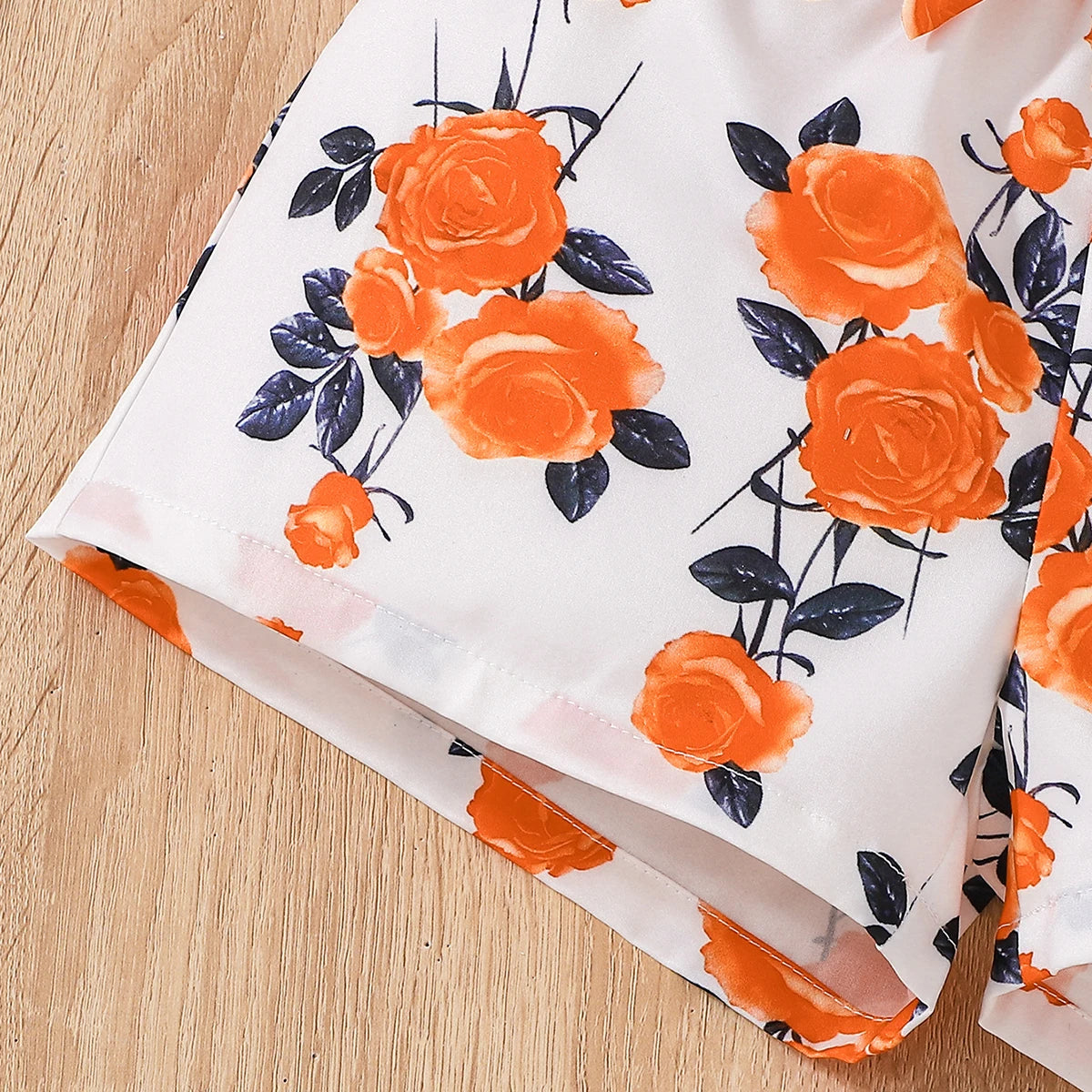Ensemble Bébé Fille Orange & Fleuri – Haut + Bas Imprimé