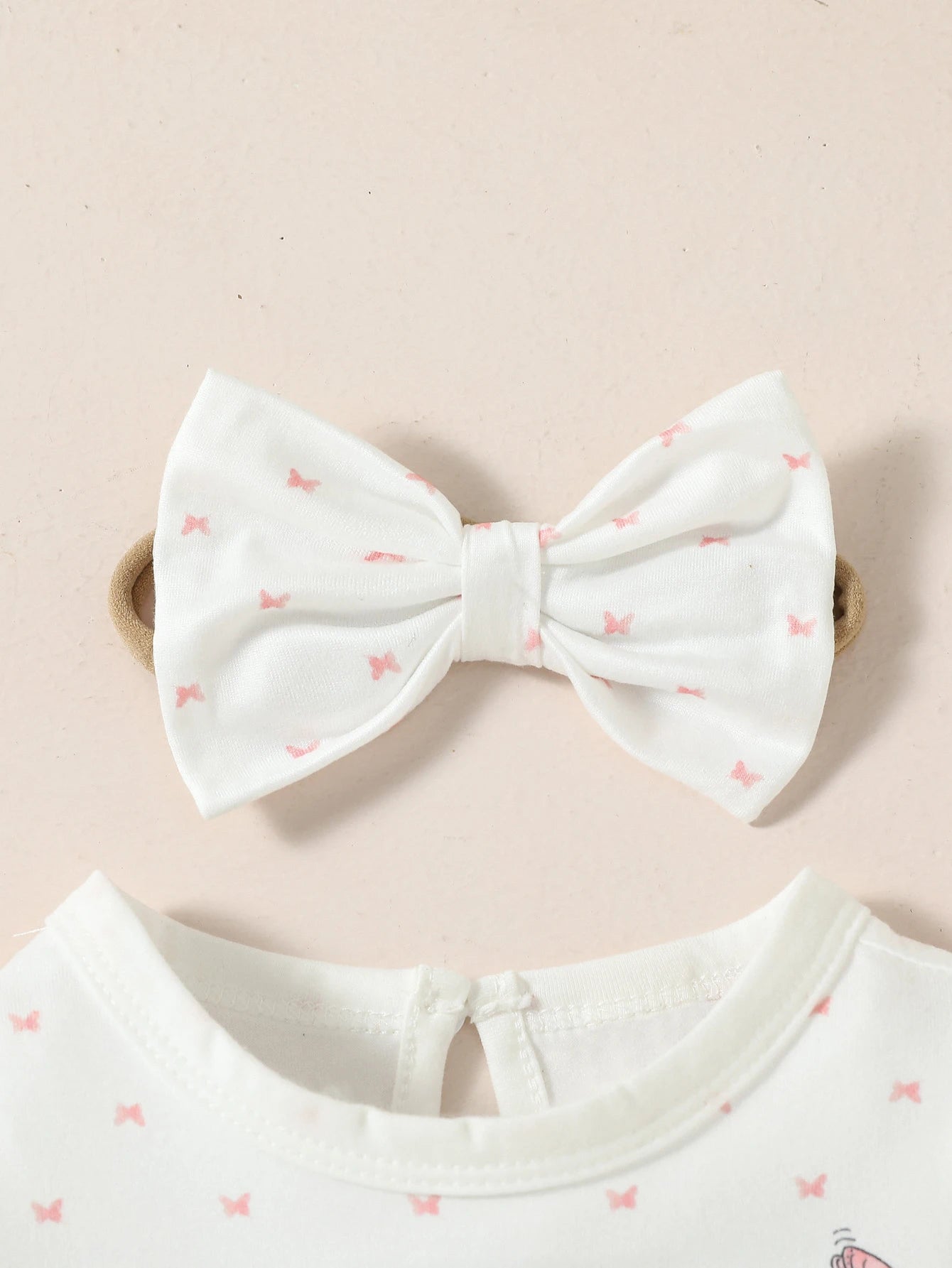 Barboteuse bébé fille sans manches – Imprimé éléphant & étoiles – Douce et confortable (0–12 mois)