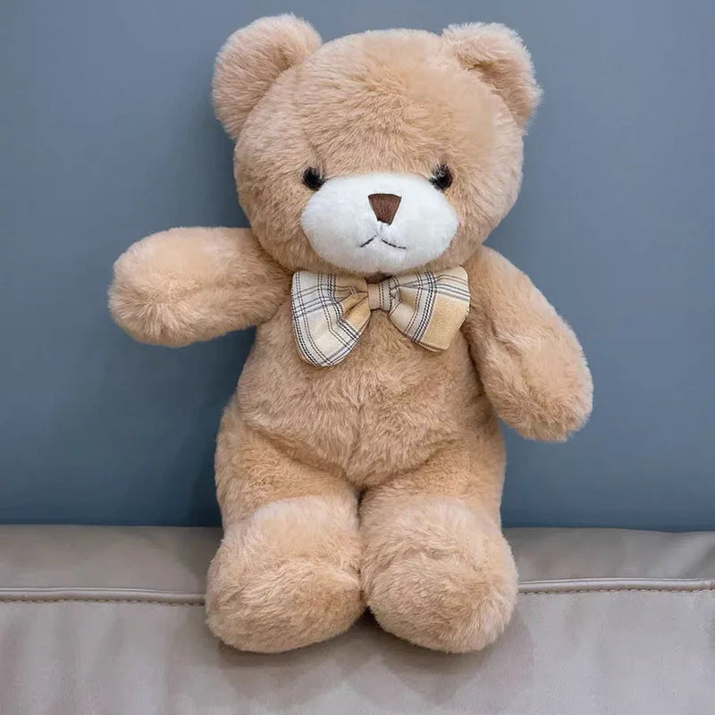 Nounours Câlin Chic  | Peluche douce avec nœud papillon – Cadeau bébé & enfant (30 cm)