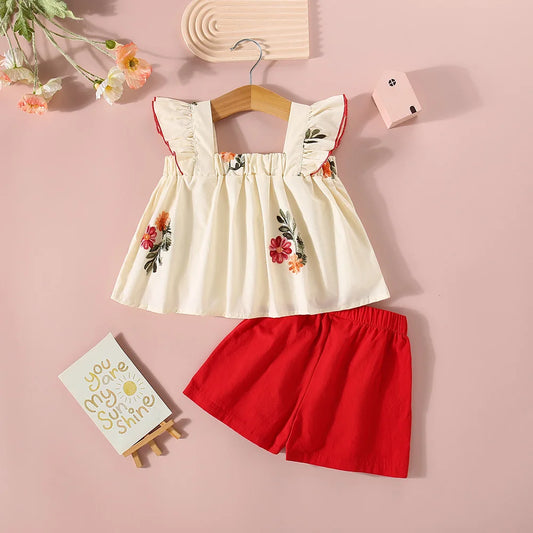 Ensemble d’été fille 2 pièces – Haut fleuri à manches courtes & short uni