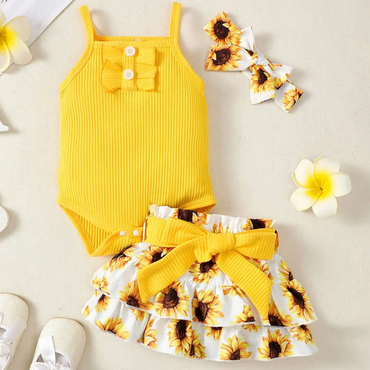 Tenue d’été bébé fille – Ensemble jaune motif tournesols avec jupe et bandeau