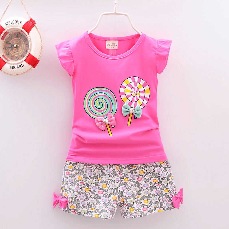 Ensemble Fille Été “Lollipop” – T-shirt + Short/Short-jupe imprimé (4–6 ans)