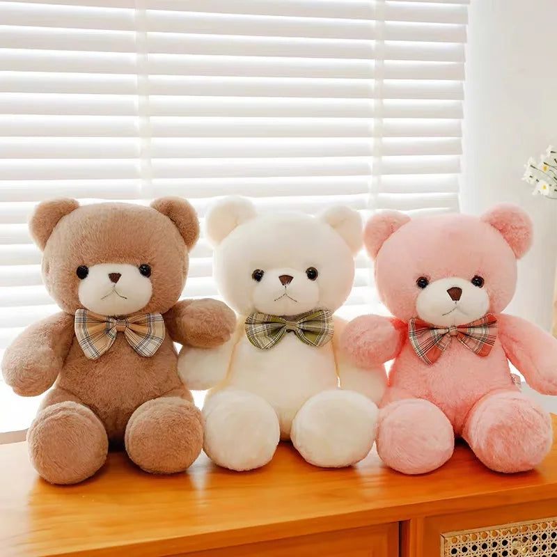 Nounours Câlin Chic  | Peluche douce avec nœud papillon – Cadeau bébé & enfant (30 cm)