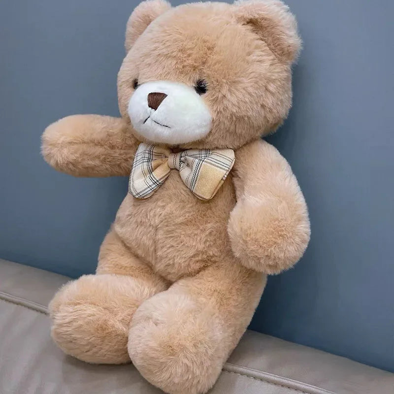 Nounours Câlin Chic  | Peluche douce avec nœud papillon – Cadeau bébé & enfant (30 cm)