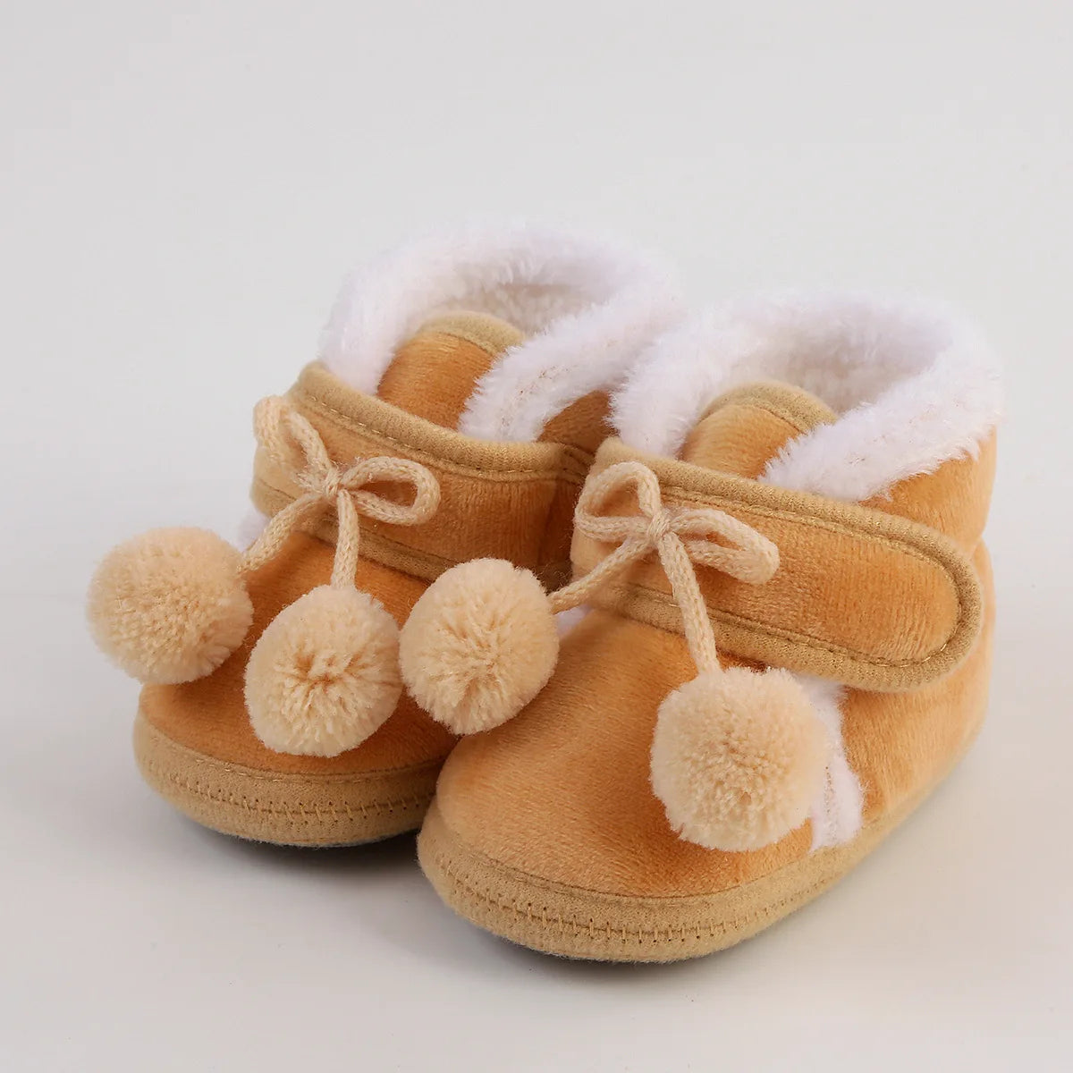 Nouvelle mode chaussures confortables nouveau-né bébé filles garçons chaussons souples solide pompon bottes de neige infantile enfant en bas âge nouveau-né chaussures chauffantes