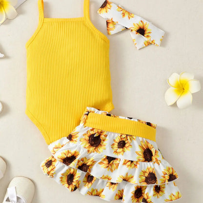 Tenue d’été bébé fille – Ensemble jaune motif tournesols avec jupe et bandeau
