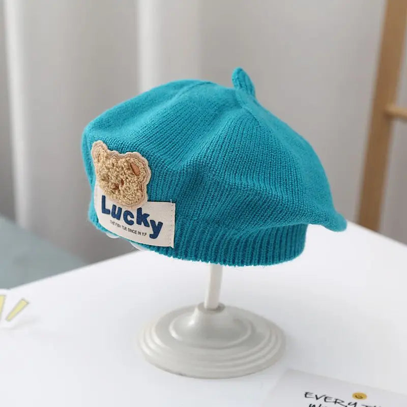 Béret Bébé en Maille Fleur – Bonnet Chaud d’Hiver