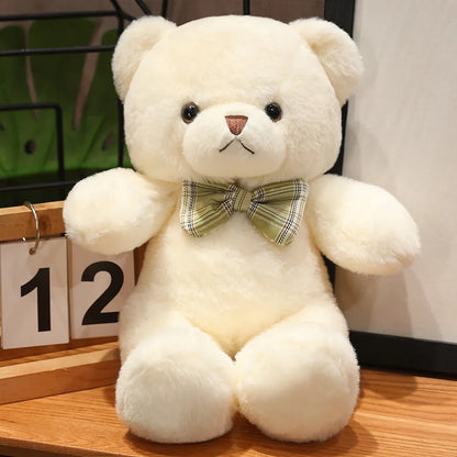 Nounours Câlin Chic  | Peluche douce avec nœud papillon – Cadeau bébé & enfant (30 cm)