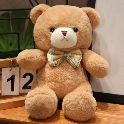 Nounours Câlin Chic  | Peluche douce avec nœud papillon – Cadeau bébé & enfant (30 cm)