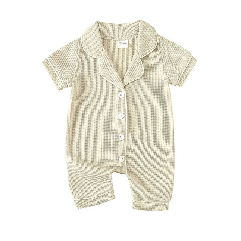 Barboteuse bébé unisexe à manches courtes – Pyjama confortable (0–24 mois)
