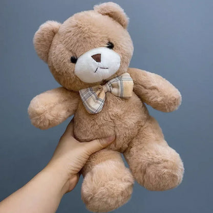 Nounours Câlin Chic  | Peluche douce avec nœud papillon – Cadeau bébé & enfant (30 cm)
