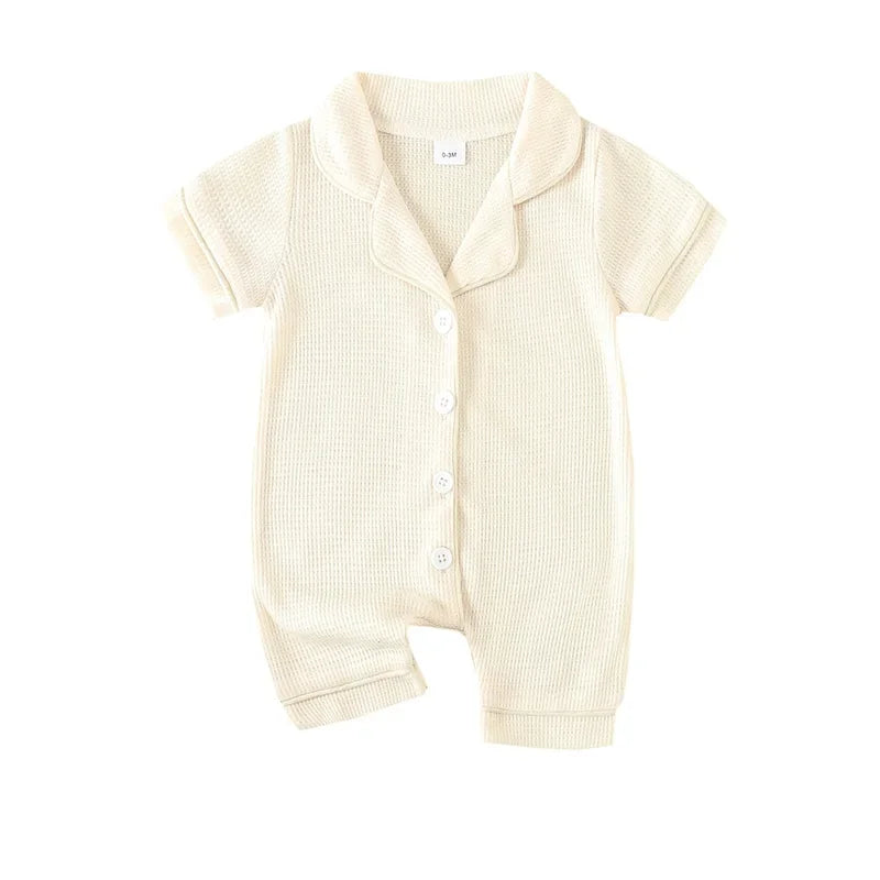 Barboteuse bébé unisexe à manches courtes – Pyjama confortable (0–24 mois)