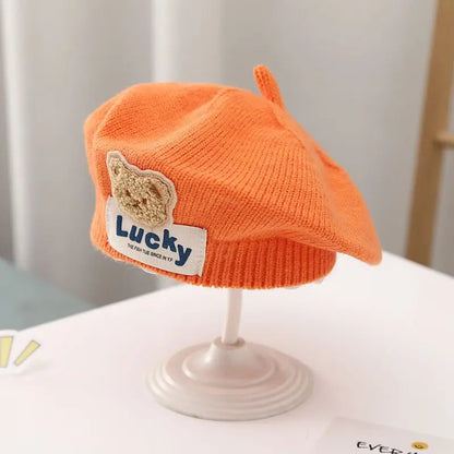 Béret Bébé en Maille Fleur – Bonnet Chaud d’Hiver