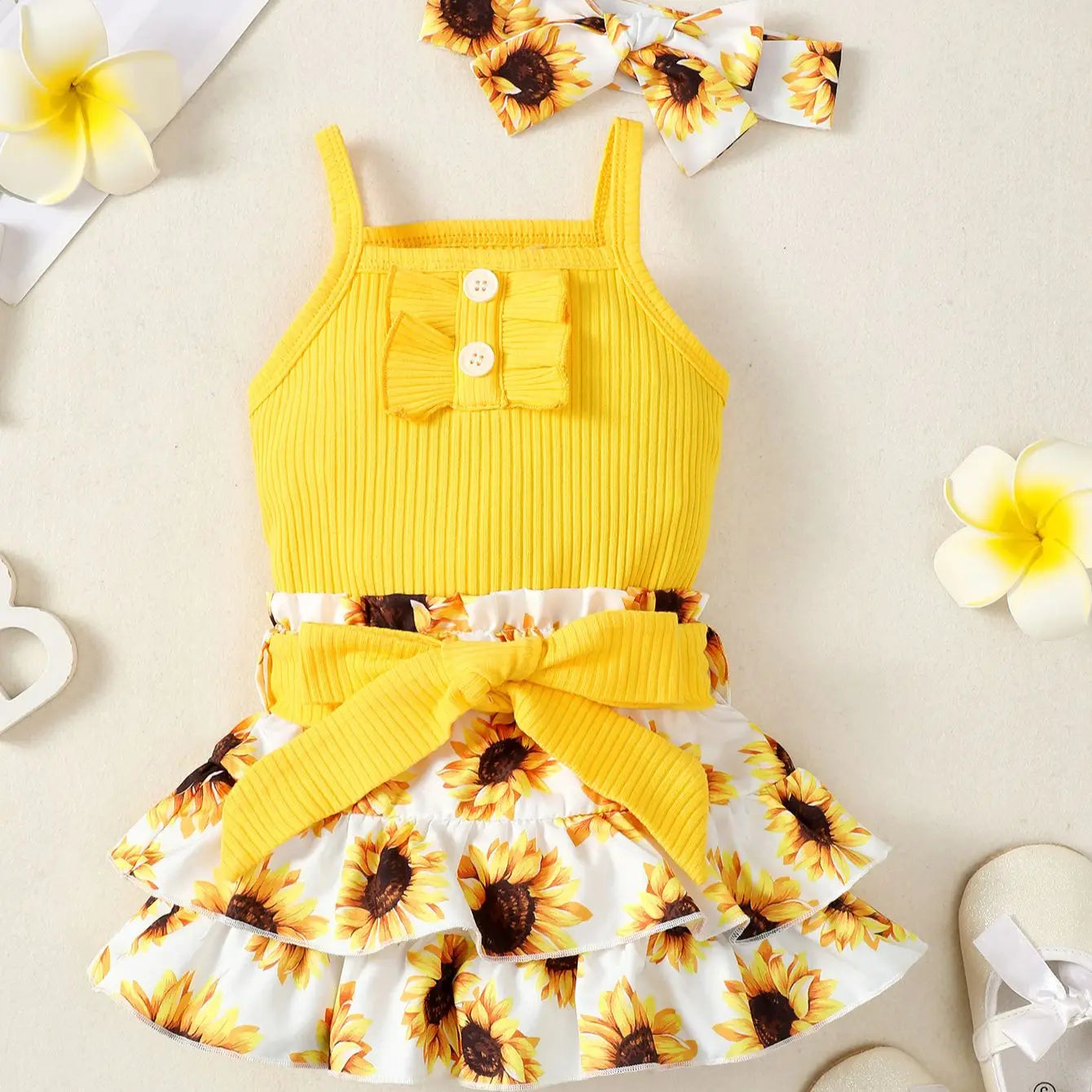 Tenue d’été bébé fille – Ensemble jaune motif tournesols avec jupe et bandeau