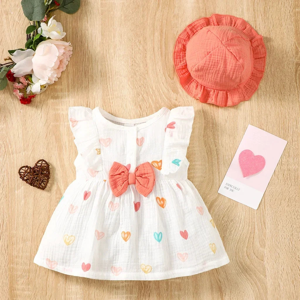 Robe d’été pour bébé fille – Ensemble 2 pièces coton doux avec motif cœurs et chapeau assorti